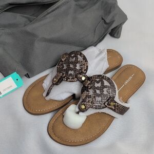 Report Brown and Tan Sandals